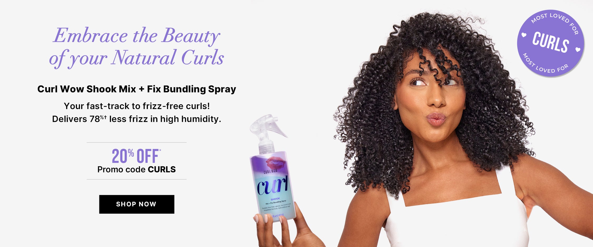 Promotional banner featuring a woman with natural curly hair holding a bottle labeled curl WOW Shook Mix + Fix Bundling Spray. Large headline reads Embrace the Beauty of your Natural Curls. Subheading: Curl Wow Shook Mix + Fix Bundling Spray. Body text: Your fast-track to frizz-free curls! Delivers 78%† less frizz in high humidity. Offer text: 20% OFF* Promo code CURLS. Button reads SHOP NOW. Purple badge says MOST LOVED FOR CURLS with MOST LOVED FOR repeated around the circle.