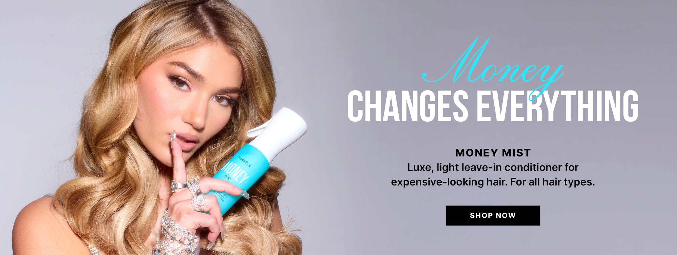 Money Changes Everything campaign featuring a model holding Color Wow MONEY MIST. Text reads Money Changes Everything. MONEY MIST. Luxe, light leave-in conditioner for expensive-looking hair. For all hair types. Black button reads SHOP NOW.
